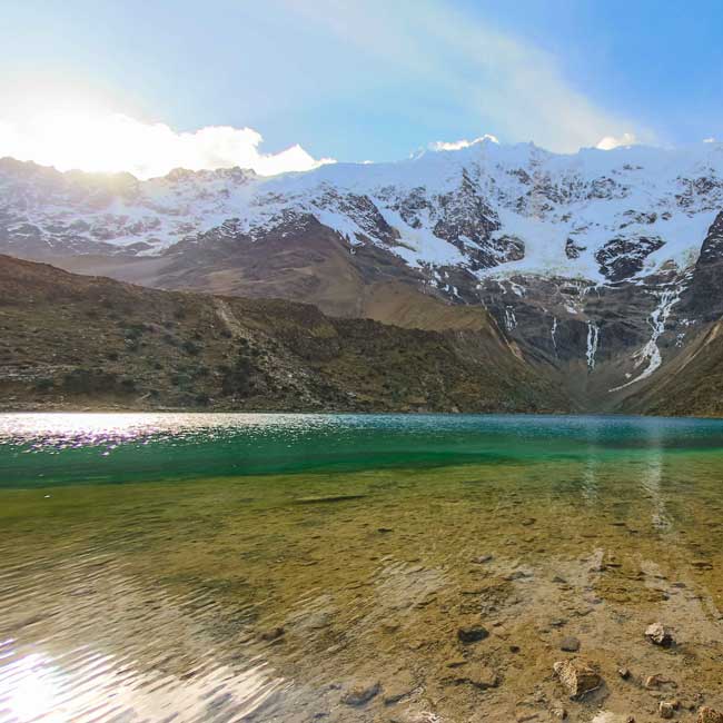 view of the humantay lagoon and its crystalline waters